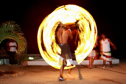 The nightly fire dance in front of the Mancora bars ights up the night sky